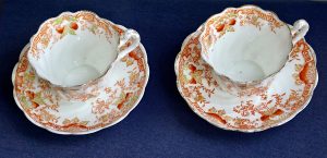 Set of two antique china cups and saucers