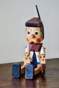 Vintage Wooden Pinocchio Sitting Puppet Handmade Painted
