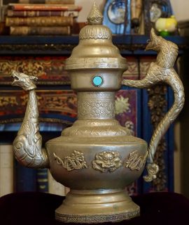 Antique Tibetan silver teapot with two turquoise