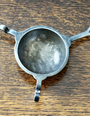 Antique Tea Strainer, The Strand Hotel, 1910